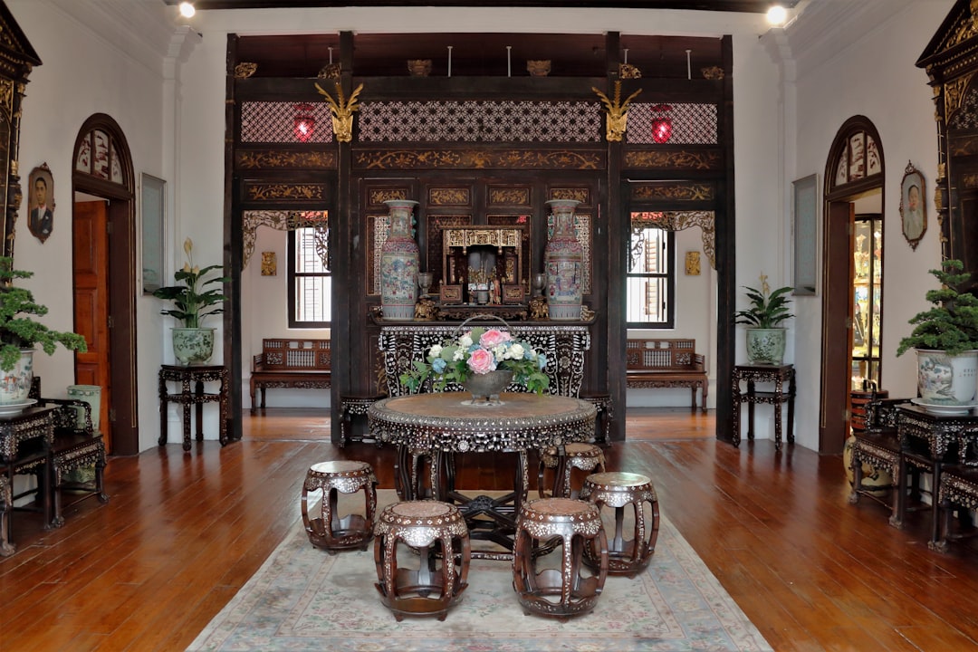 Heritage shophouse hotel room in Malacca with high ceilings and colonial-style furnishings