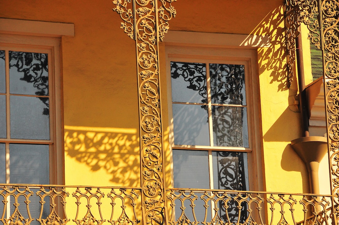 Wrought-iron balcony detail on a historic Dauphin Street building in Mobile Alabama