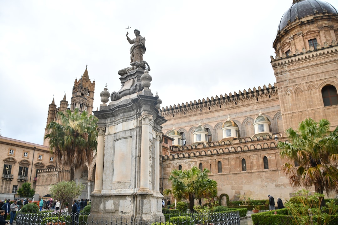 Cloister of Monreale Cathedral in Sicily with pointed arches and mosaic columns