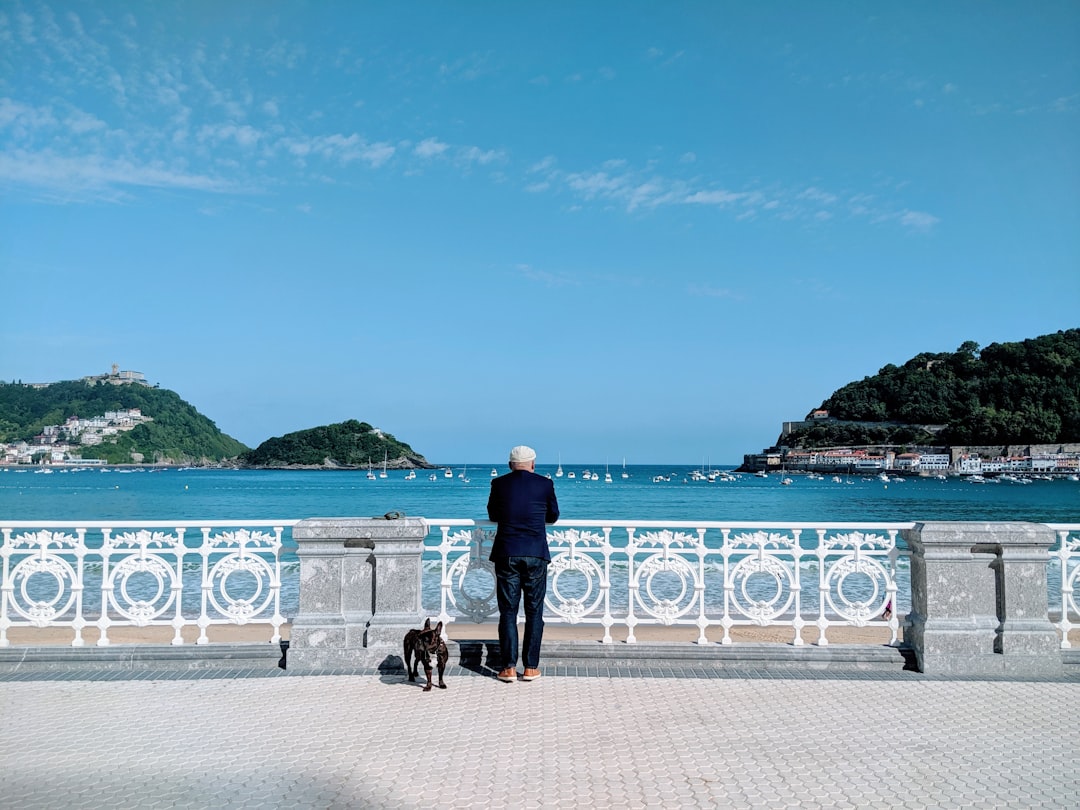Belle Époque wrought-iron railings on La Concha promenade San Sebastián with bay view