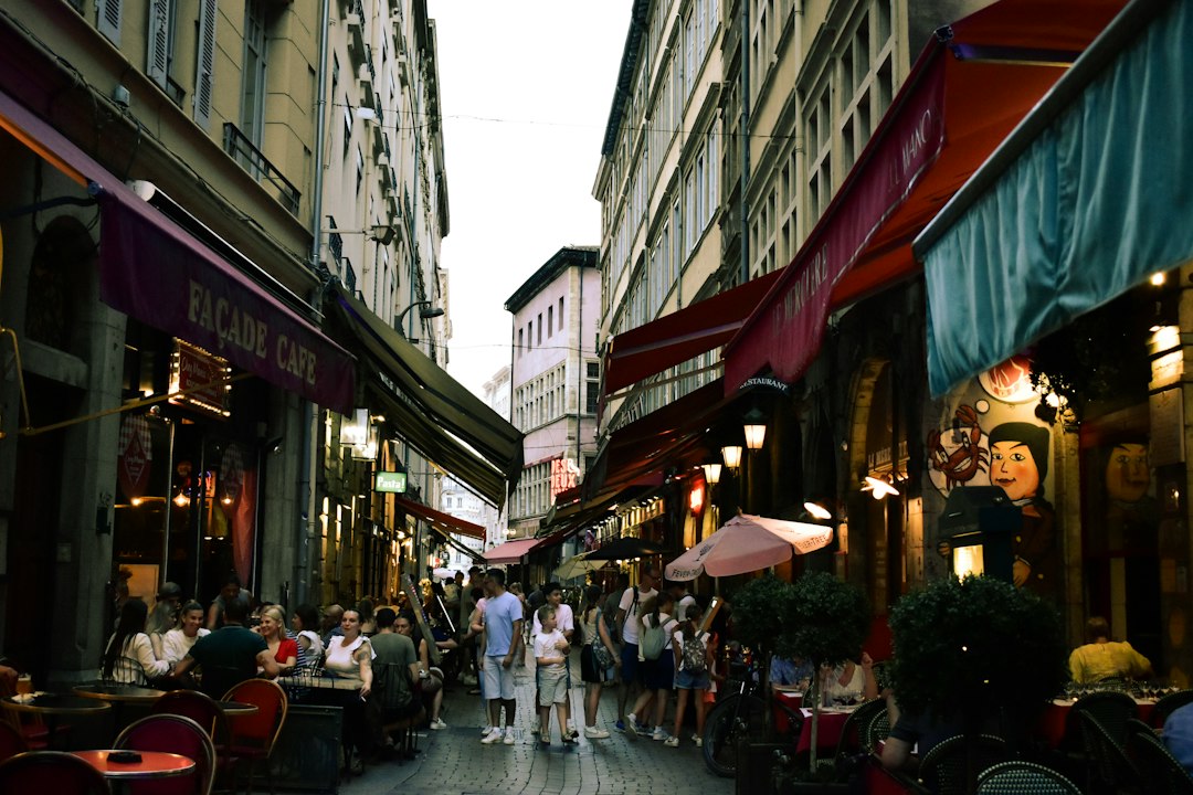 Traditional bouchon lyonnais restaurant in Lyon with red-checked tablecloths and classic Lyonnaise cuisine