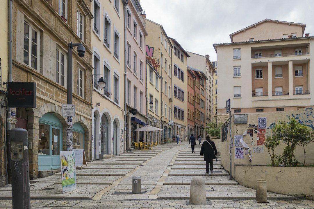 Cour des Voraces staircase in Croix-Rousse Lyon — multi-story open courtyard used by silk workers and Resistance