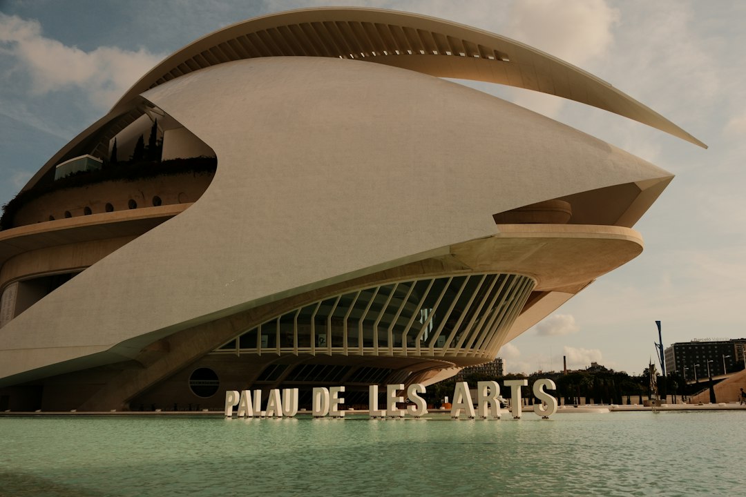 City of Arts and Sciences Valencia Spain reflected in water at golden hour