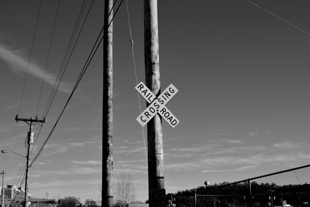 Grayscale photo of street sign in Pittsburgh
