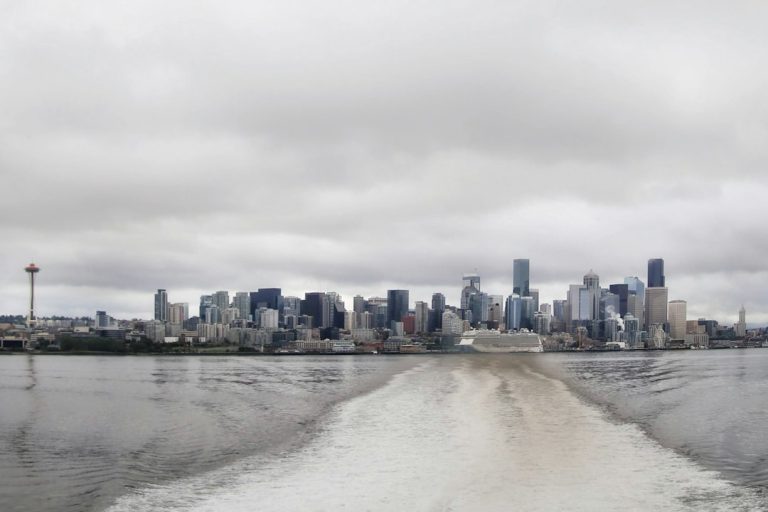 A city skyline across the water in Seattle