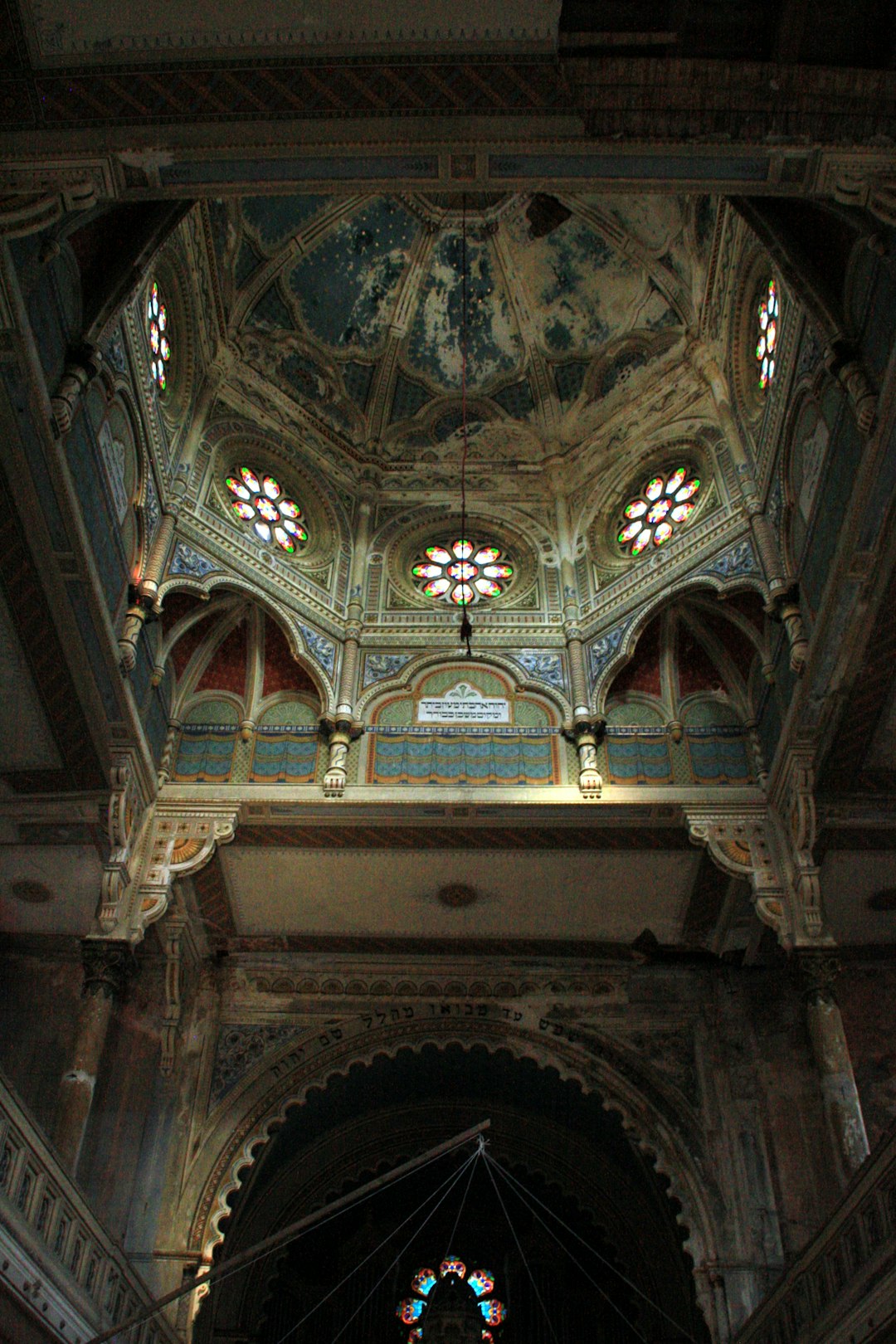 Ornate painted vaulted ceiling in a historic building in Timișoara, Romania