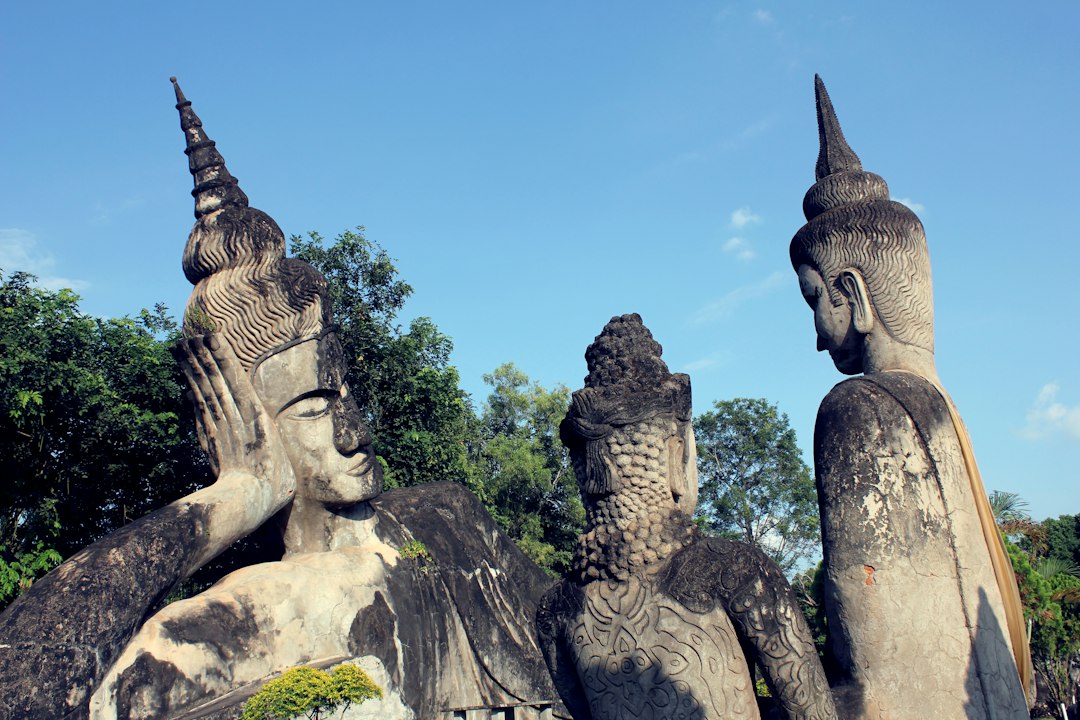 Buddha statues among trees